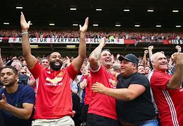 Image result for Mccann Manchester T-Shirts
