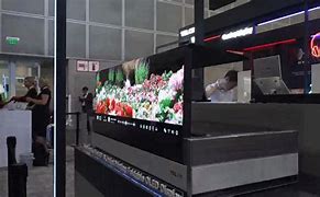 Image result for OLED TV That Folds into Table