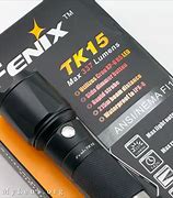 Image result for Fenix TK15 Flashlight