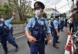 Image result for Japanese Police Catching Stick