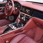 Image result for Gold Car with Red Interior