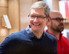 Image result for Tim Cook Eating an Apple