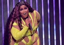 Image result for Who Is Lizzo and Flute Shock