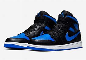 Image result for Air Jordan 1 Black with a Blue Stripe with Basketball Imprints On the Body