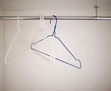 Image result for Velvet Clothes Hangers with Cascading Hooks