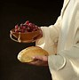 Image result for Catholic Jesus Breaking Bread