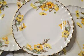 Image result for Vintage Daisy Yellow Black and White Dishes