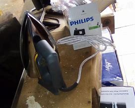 Image result for Philips Flat Iron Jiji Uganda