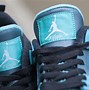 Image result for All-Black Jordan 4S