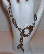 Image result for Handcuff Key Bracelet