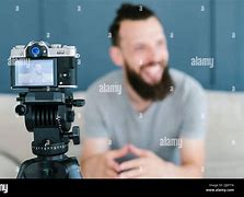 Image result for Man with Video Camera Stand