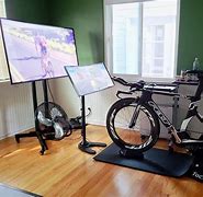 Image result for Stationary Bike Gaming Desk Setup