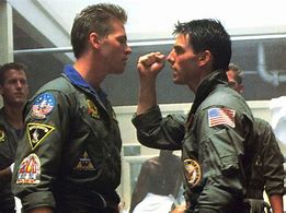 Image result for Tom Cruise Carrying Top Gun
