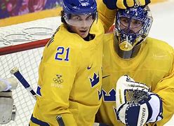 Image result for Finland Winning Over Sweden in Ice Hockey