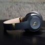 Image result for Person Wearig Rose Gold Beats