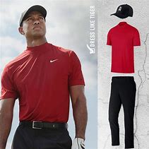 Image result for Tiger Woods Red Shirt and Blue Hat