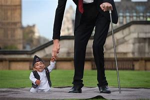Image result for Tallest Smallest Man in the World