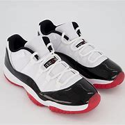Image result for Air Jordan 11 Low White Red
