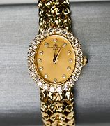 Image result for Baume Mercier 18K Gold Watch