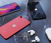 Image result for Apple iPhone 3rd Generation Red SE