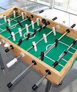 Image result for Images of Foosball Table at Work