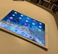Image result for Apple iPad Headphones Gold and White