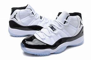 Image result for Jordan 11 Black White and Red Jumpman Christmas Release