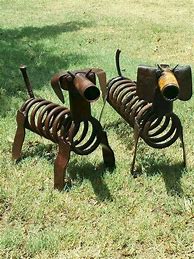 Image result for Metal and Rock Yard Art