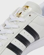 Image result for Men's All White Sneakers