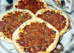 Image result for Middle Eastern Food That Looks Like a Pizza Boat