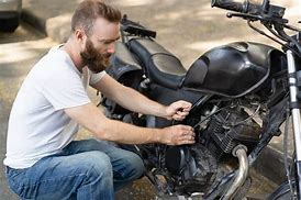 Image result for Man Riding Broken Motorcycle
