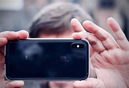 Image result for Taking Photos with iPhone SE