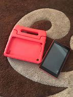 Image result for Red Kindle