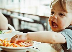 Image result for Kid Eaiting Pasta