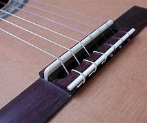 Image result for Classical Guitar Bridge Saddle