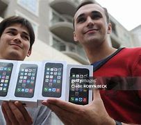 Image result for iPhone 5S in Hand