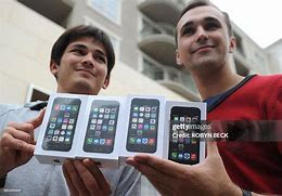 Image result for iPhone 5S in Hand