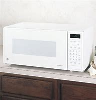 Image result for GE Spacemaker II Microwave Oven