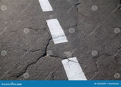 Image result for Broken Road Surface Sign