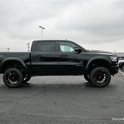 Image result for Ram 1500 4x4 Lifted Hevy Duty White and Black