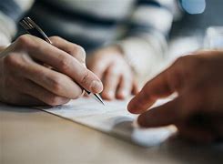 Image result for Modern Photo of a Man Signing a Contract