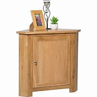 Image result for Oak Corner Storage Cabinet