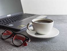 Image result for Coffee Cup On Desk