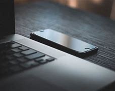 Image result for Black iPhone in the Office