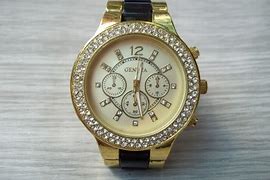 Image result for Gucci Gold Watch