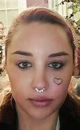 Image result for Amanda Bynes Eye Tattoo