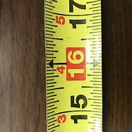 Image result for Bottom Red Numbers On a Measuring Tape