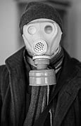 Image result for Retail Employee Wearing a Gas Mask to Work