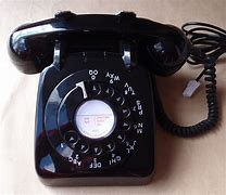 Image result for Round Dial Telephone
