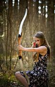 Image result for Woman Holding Bow Silhouette